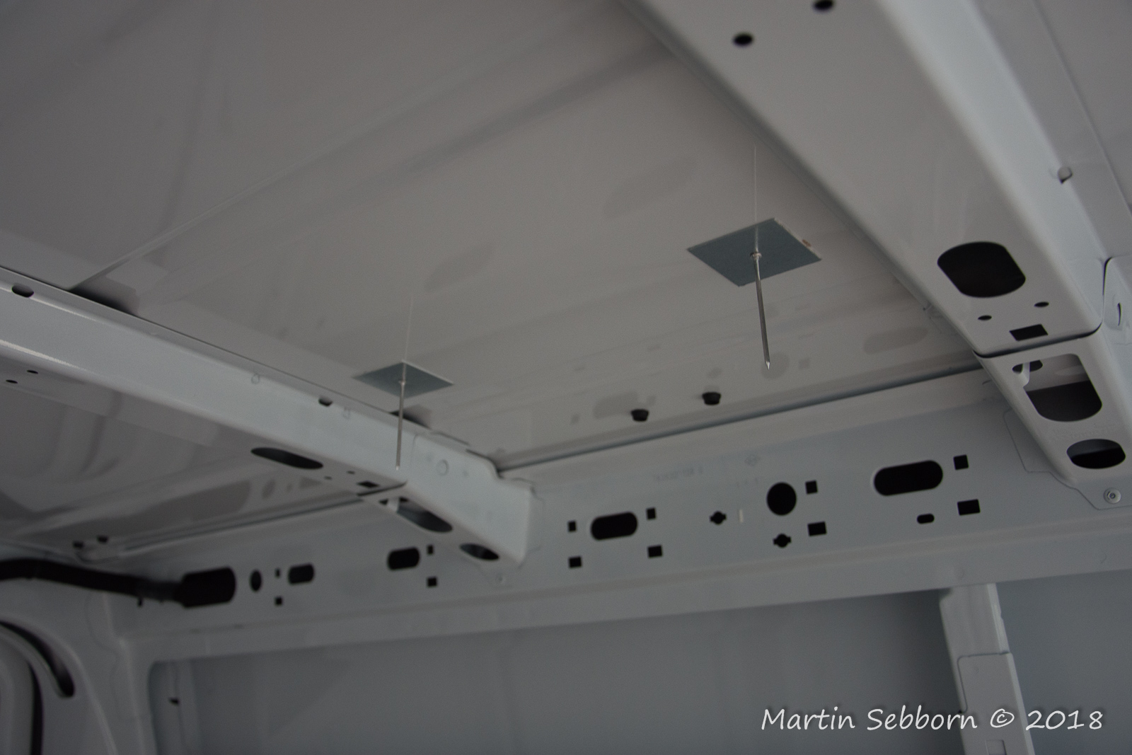 Stick pins in place